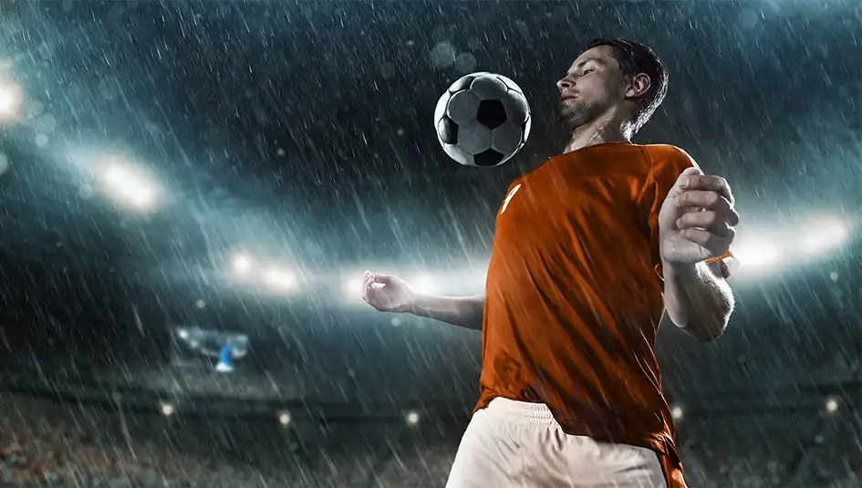 Sports field under rain with players adapting strategy, reflecting the effect of weather and sports betting